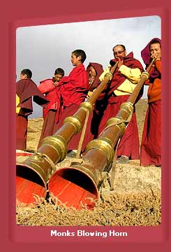 Buddhist Monks Blowing Horn